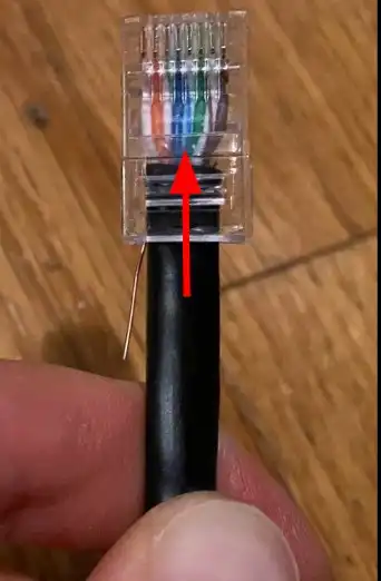 Inserting the CAT 5 wires inside the connector